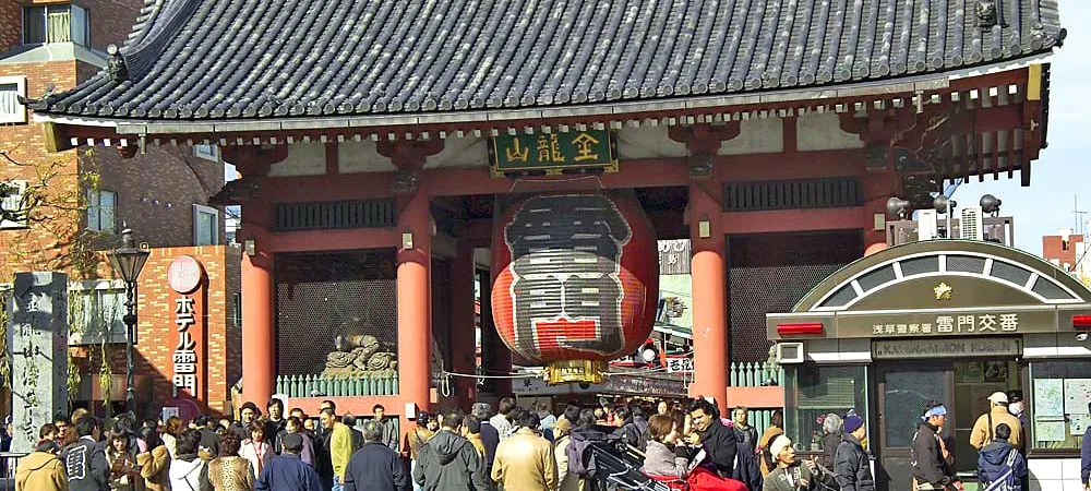 Kaminarimon, the red Thunder Gate at the entrance to Senso-ji temple in Asakusa, hung with a giant paper lantern