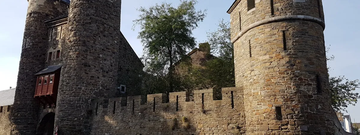 The round medieval towers of the Helpoort, the oldest surviving city gate in the Netherlands