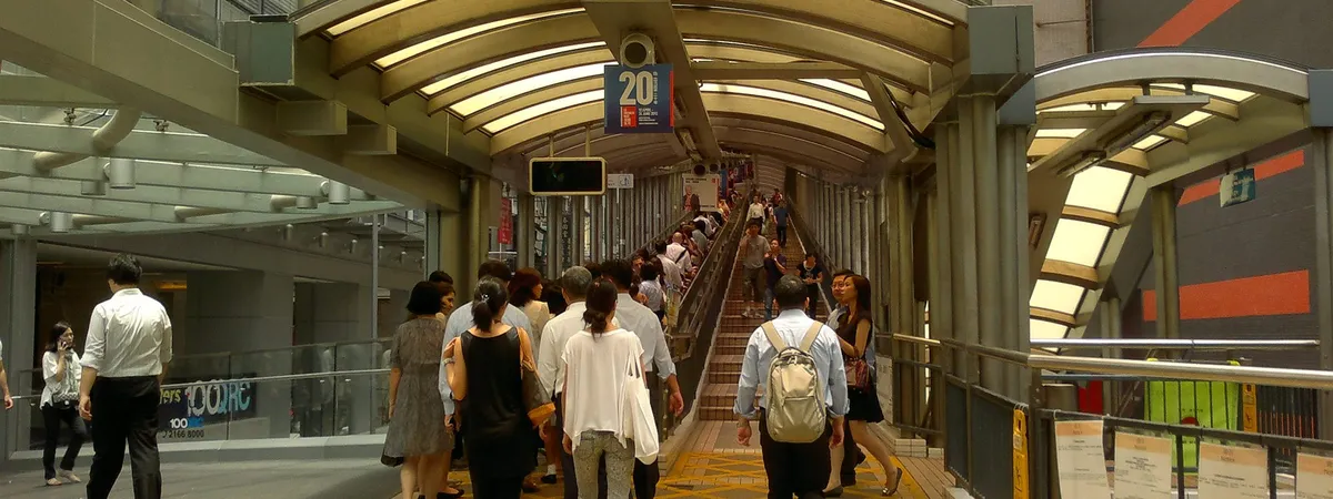 The entrance to the Central–Mid-Levels Escalator, the covered outdoor escalator system climbing through Hong Kong's Central district