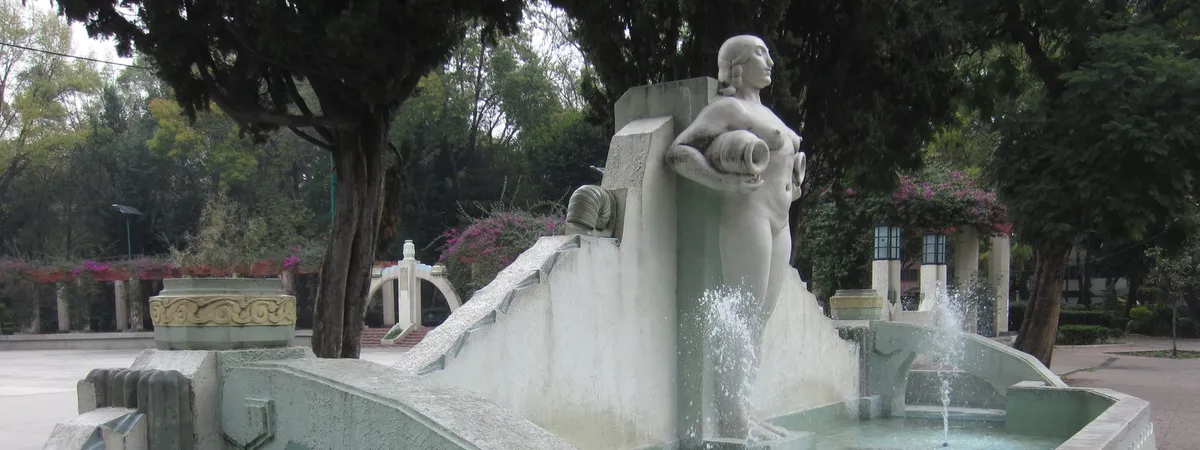 The Art Deco Fuente de los Cántaros fountain in Parque México, Condesa, with a sculpted figure carrying water jars