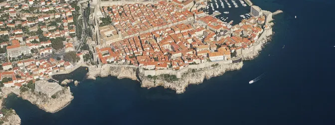 Aerial view of Dubrovnik's walled Old Town jutting into the Adriatic Sea