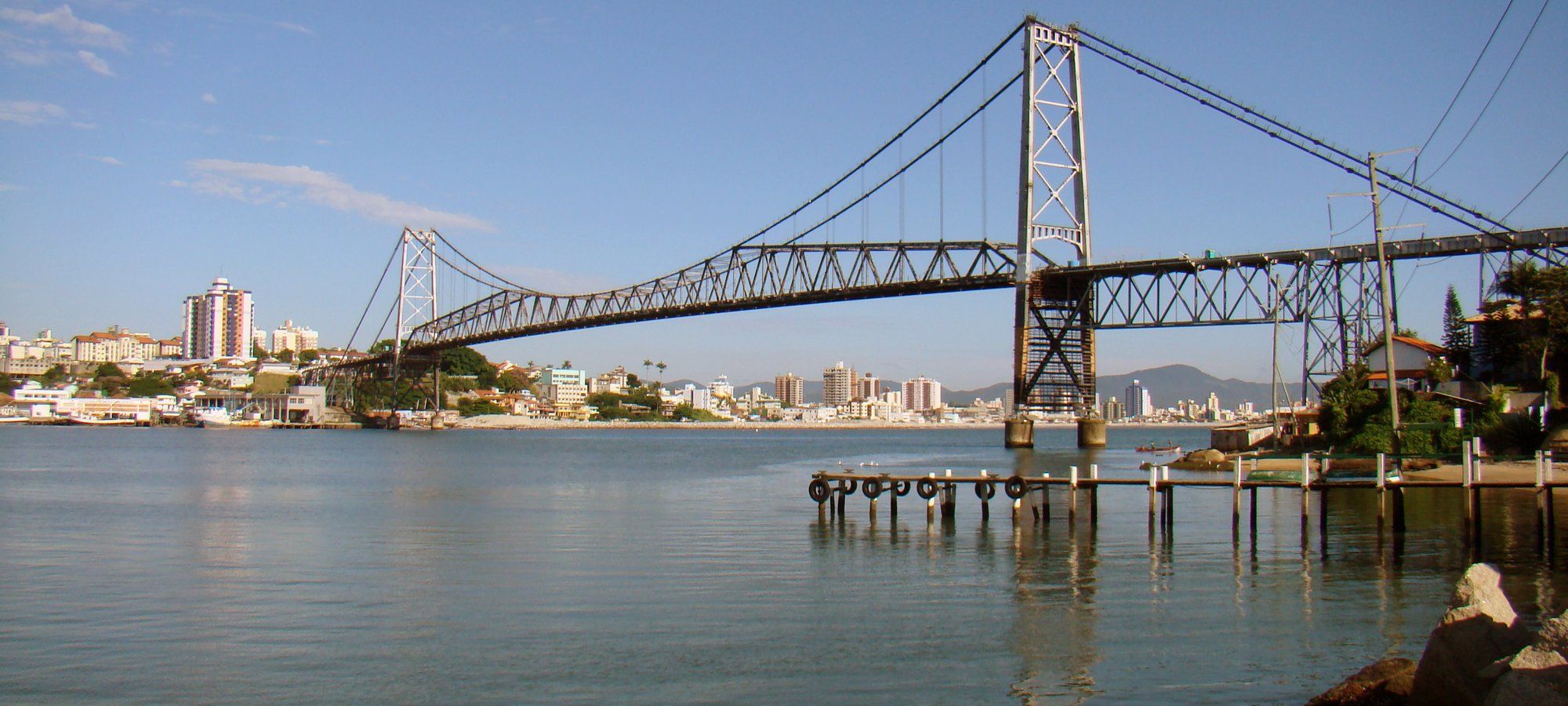 The Hercílio Luz suspension bridge spanning the bay between mainland Florianópolis and Santa Catarina Island at sunrise