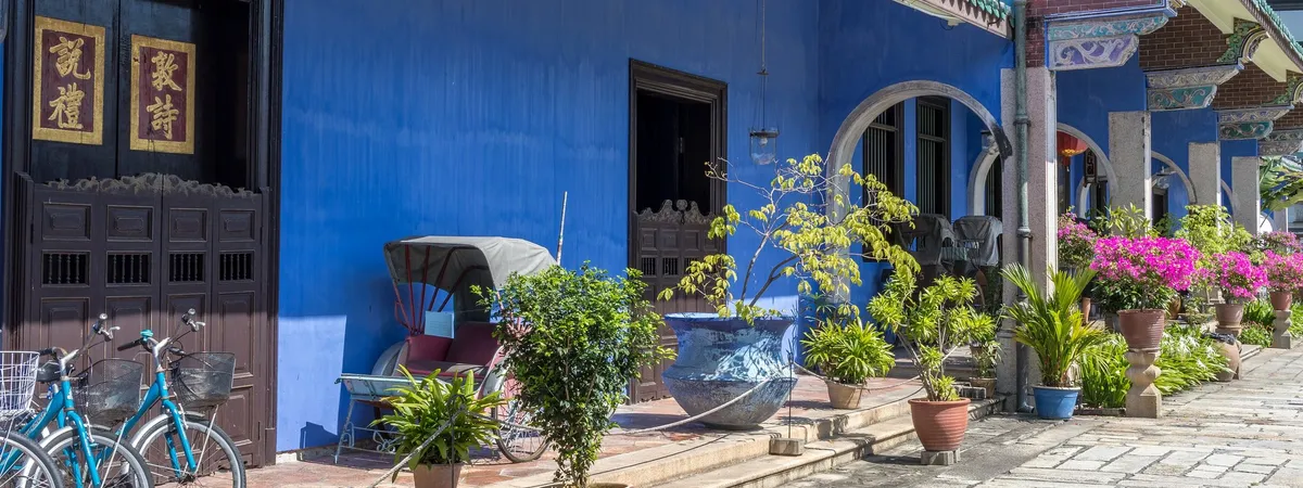 The indigo-blue facade of the Cheong Fatt Tze Mansion, the Blue Mansion, in George Town, Penang
