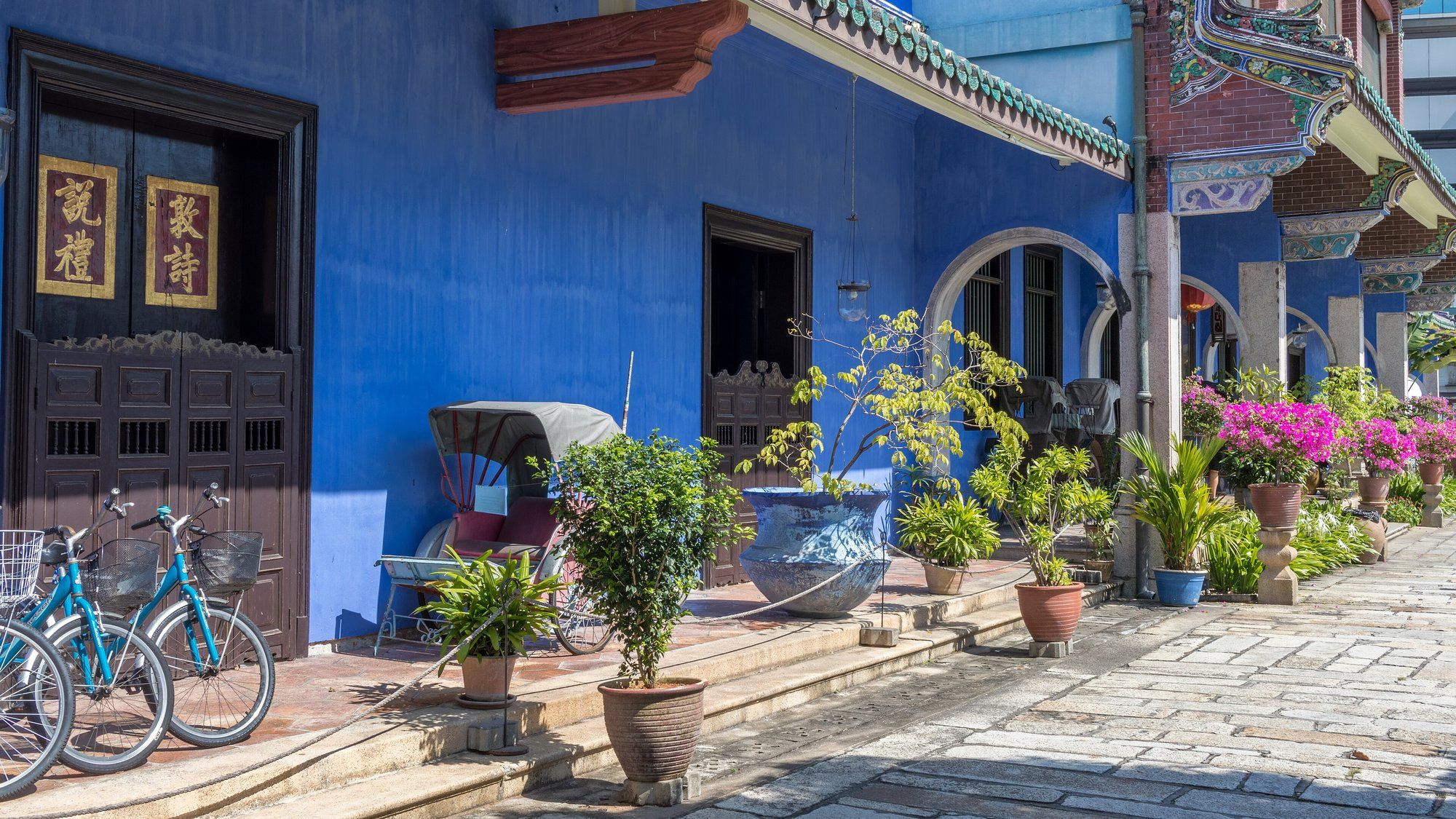 The indigo-blue facade of the Cheong Fatt Tze Mansion, the Blue Mansion, in George Town, Penang