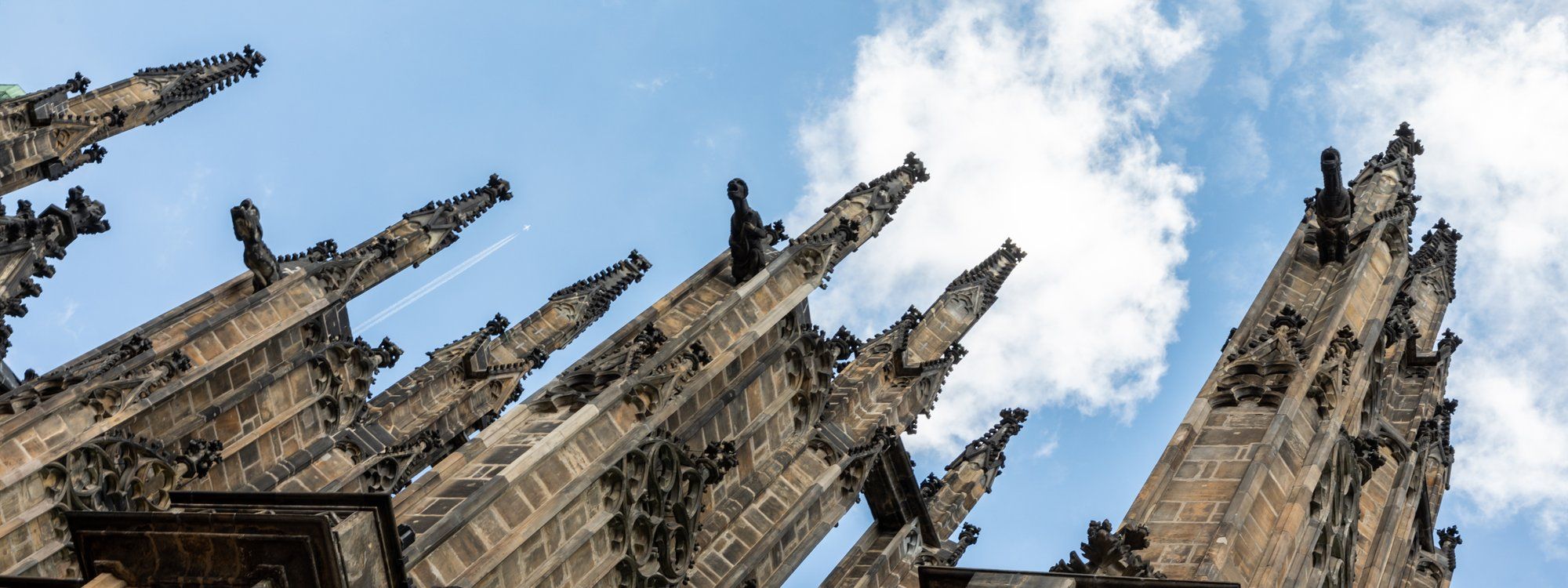 The Gothic spires of St. Vitus Cathedral rising above Prague Castle in Hradčany