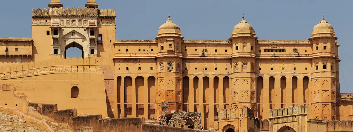 Amber Fort's sandstone and marble ramparts rising on a hillside outside Jaipur