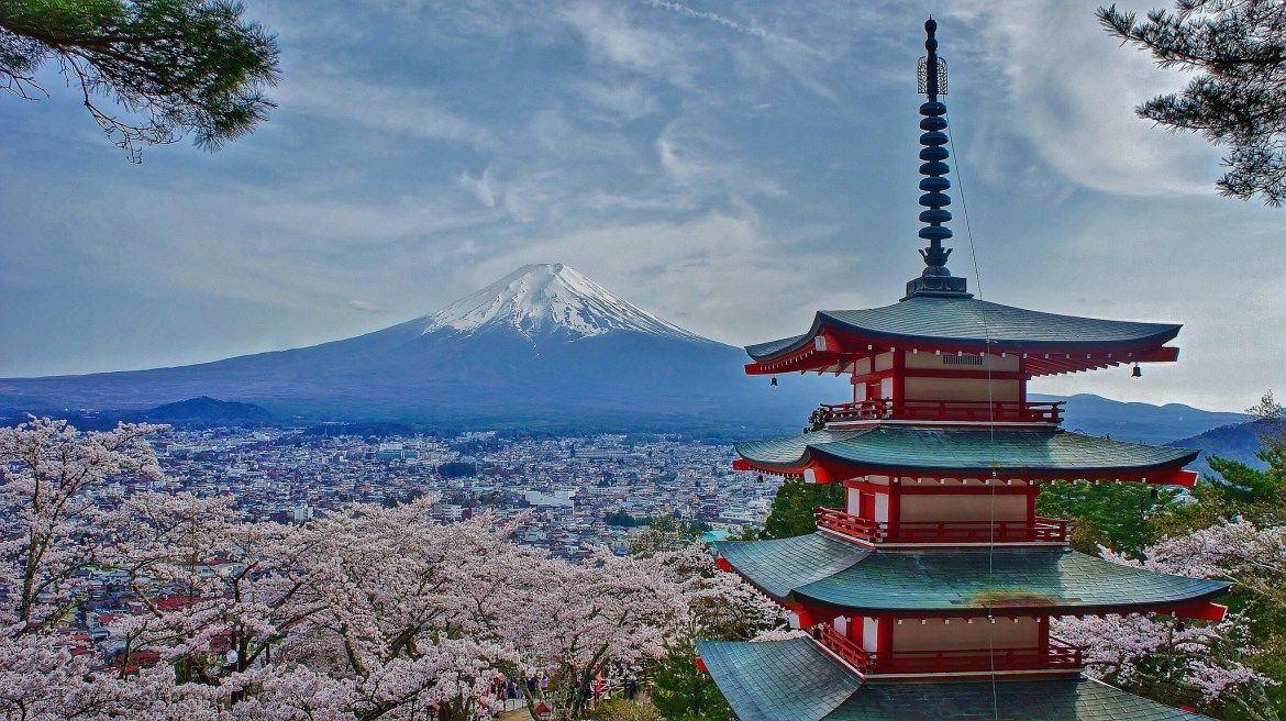 The five-story Chureito Pagoda framed against snow-capped Mount Fuji