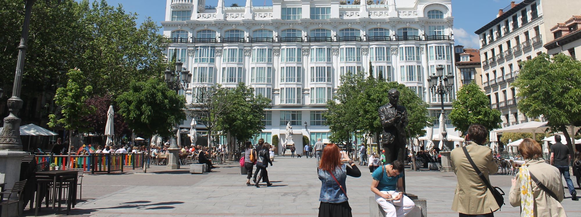 Plaza de Santa Ana in Madrid's Barrio de las Letras, with café terraces and the Reina Victoria building