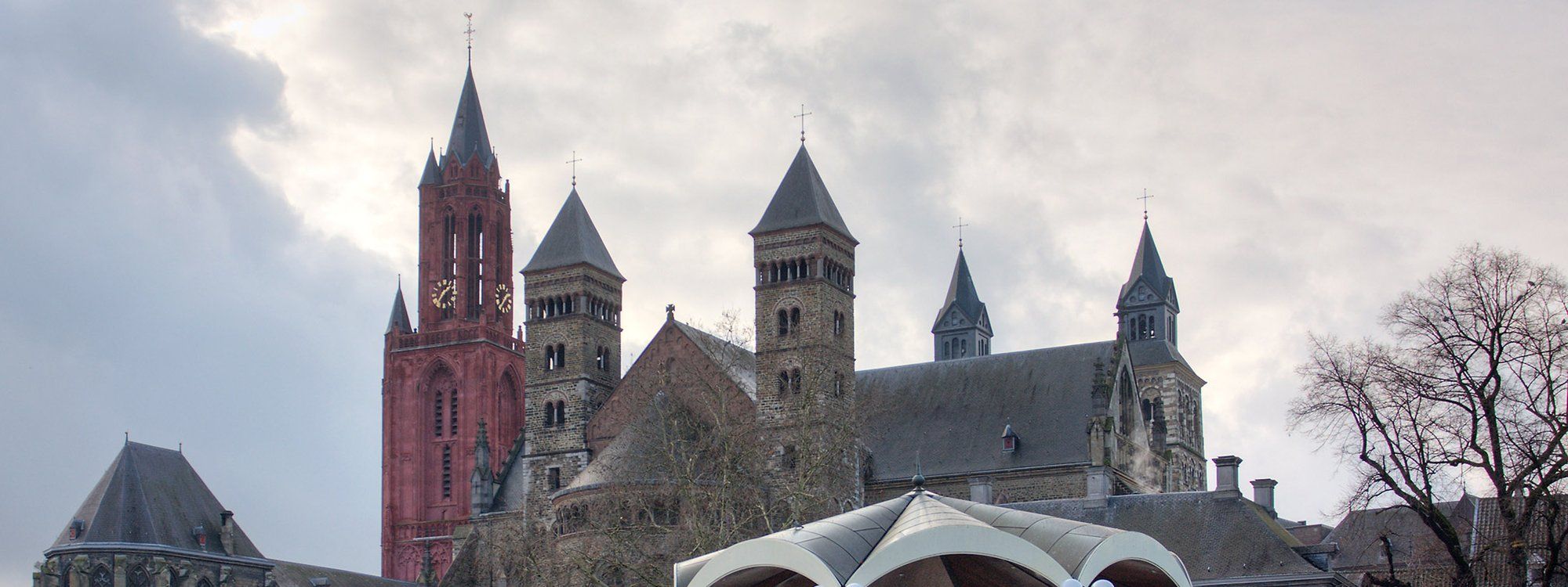 The towers of St. John's Church and the Basilica of Saint Servatius rising above the Vrijthof square in Maastricht