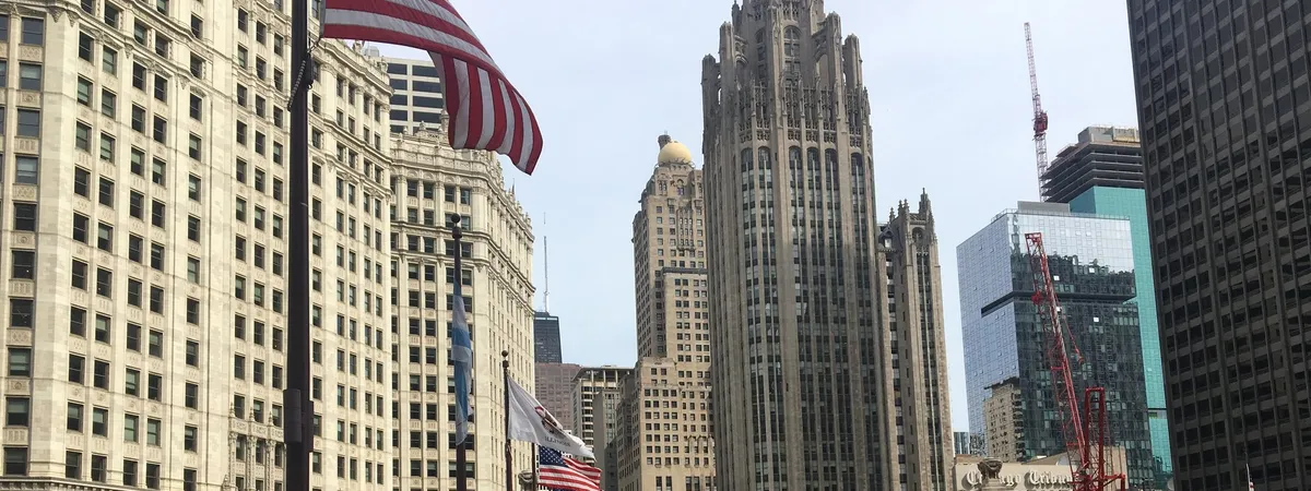 The Michigan Avenue Bridge over the Chicago River, with the Wrigley Building and Magnificent Mile skyline behind it