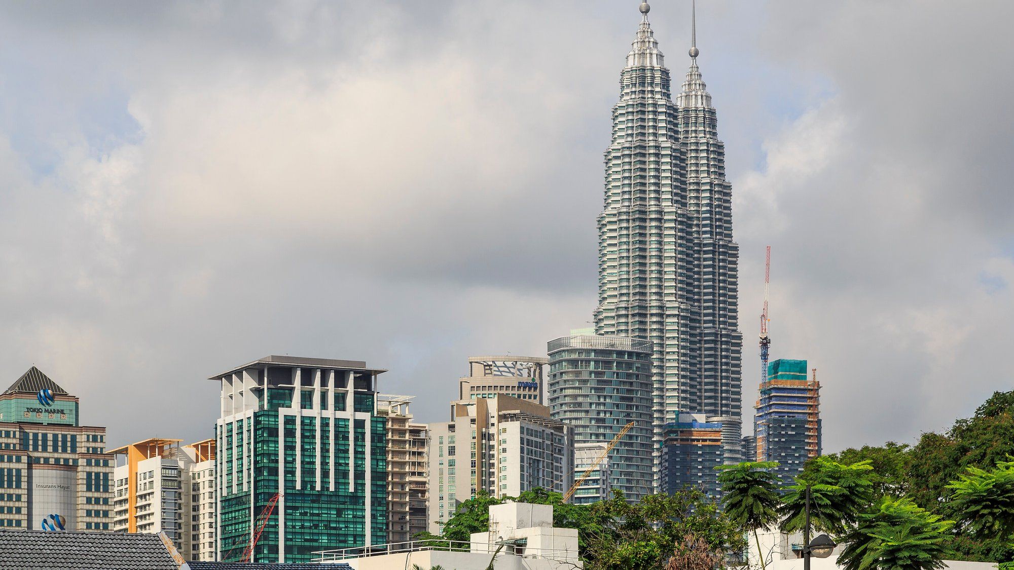 The Petronas Twin Towers rising above the Kuala Lumpur skyline