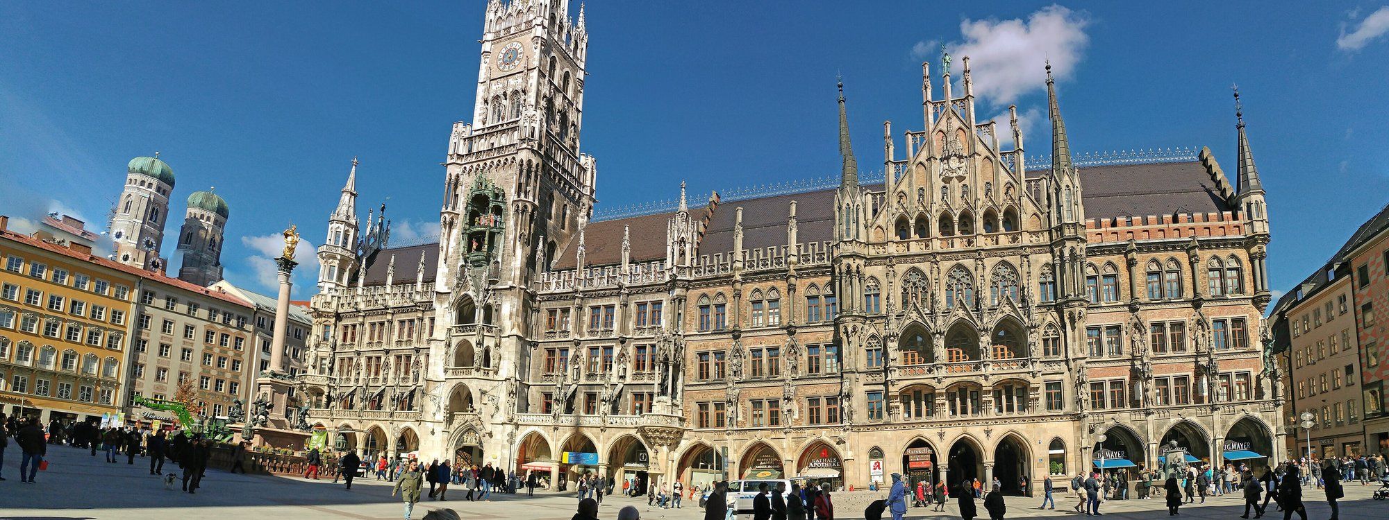 Marienplatz in Munich, with the Gothic New Town Hall and the twin onion domes of the Frauenkirche behind it