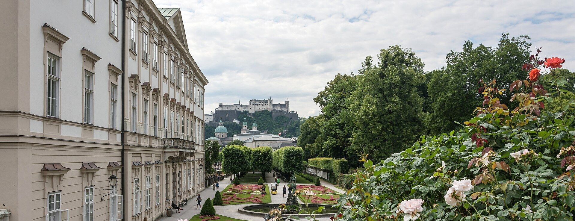 Mirabell Palace gardens with Hohensalzburg Fortress visible on the hill in the distance