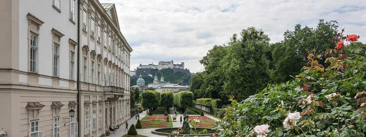 Mirabell Palace gardens with Hohensalzburg Fortress visible on the hill in the distance