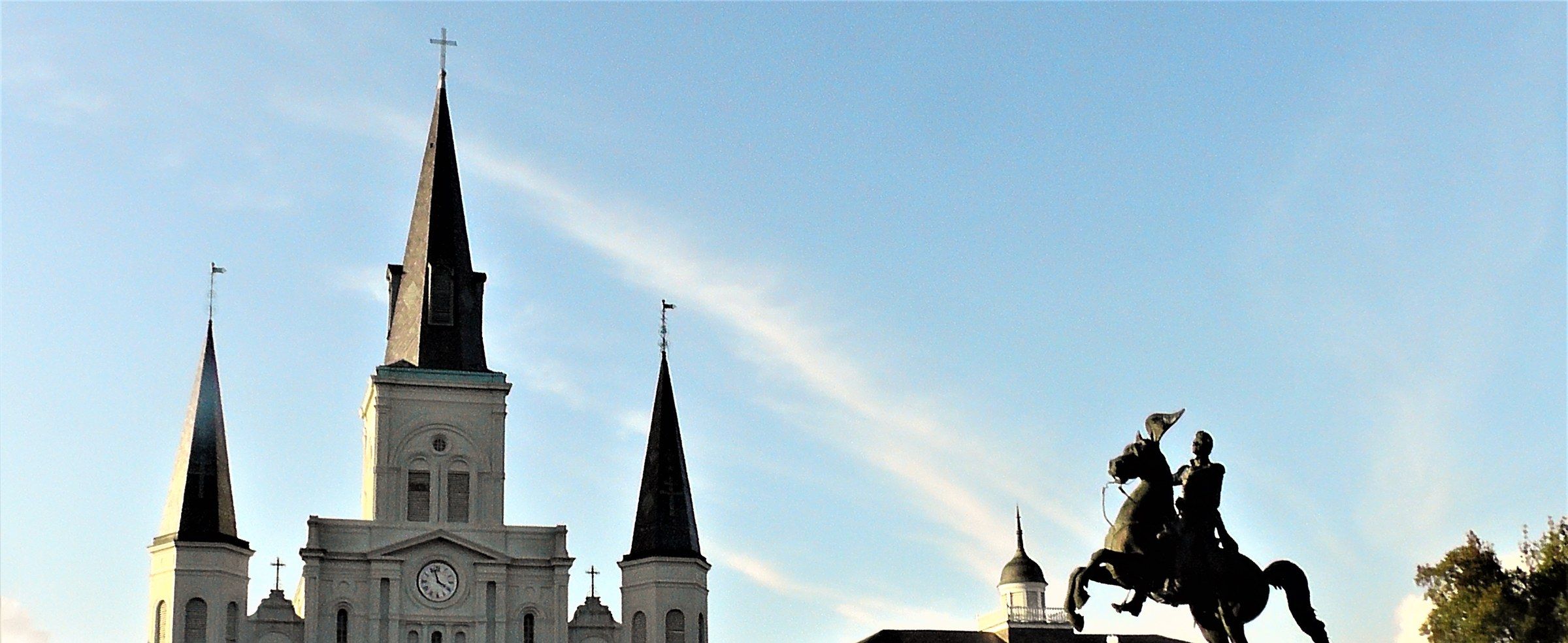 The white spires of St. Louis Cathedral and the Andrew Jackson equestrian statue in Jackson Square, French Quarter