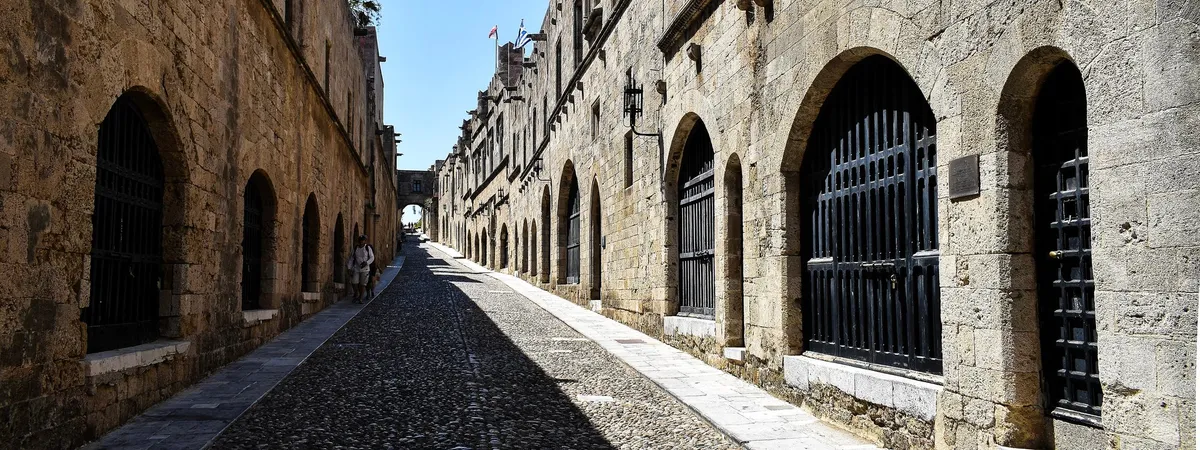The cobbled Street of the Knights, lined by the stone Inns of the Hospitaller Knights, in Rhodes Old Town
