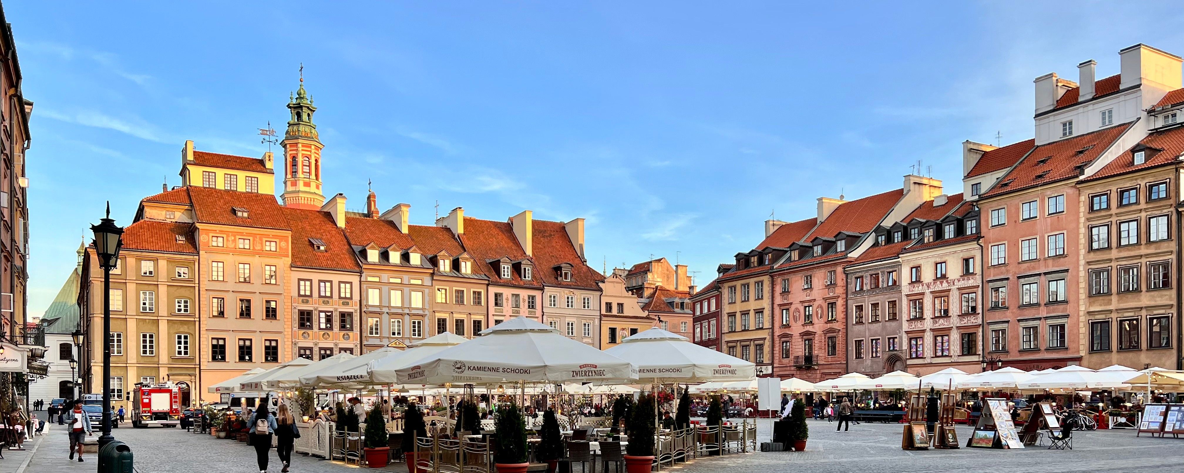 The colorful merchant houses and Old Town Hall tower of Warsaw's Old Town Market Square