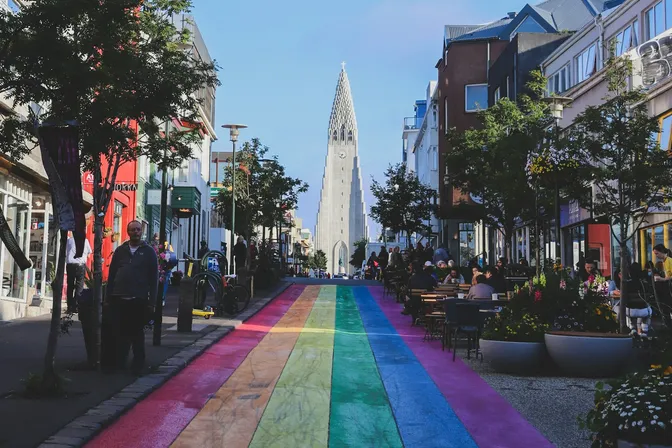 Reykjavík's rainbow-painted Skólavörðustígur leading toward Hallgrímskirkja