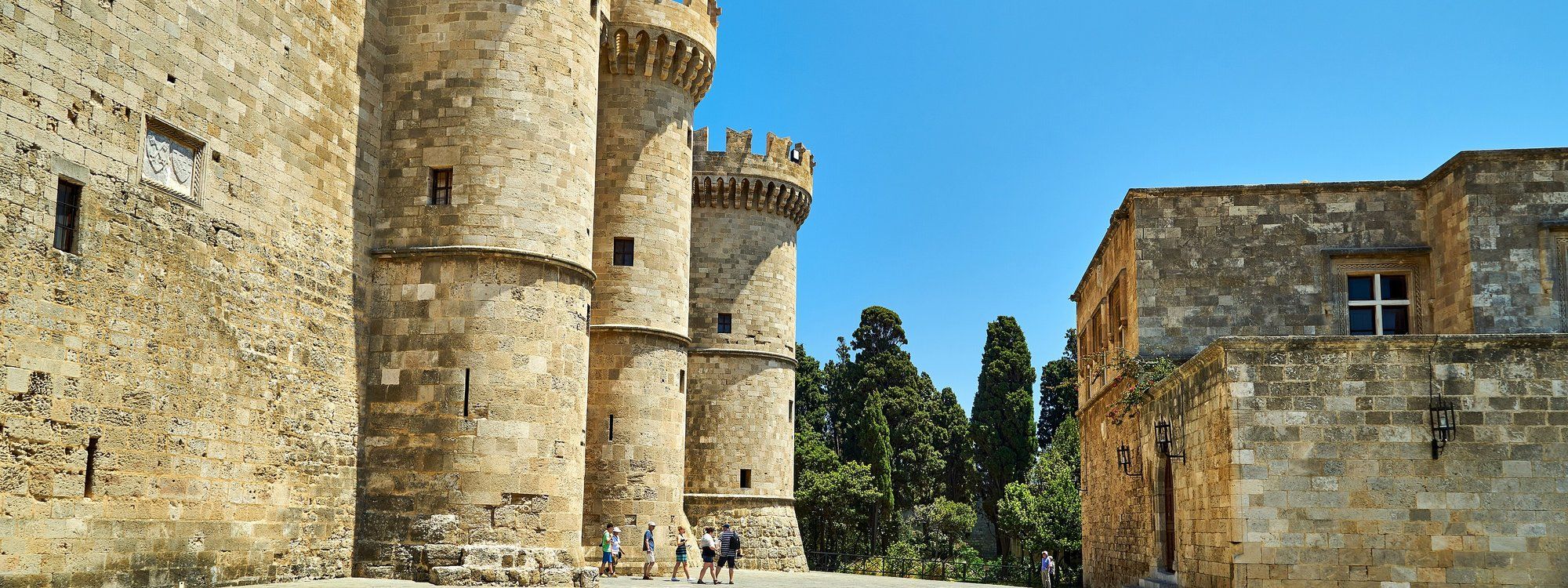 The medieval fortress towers and main gate of the Palace of the Grand Master in Rhodes Old Town