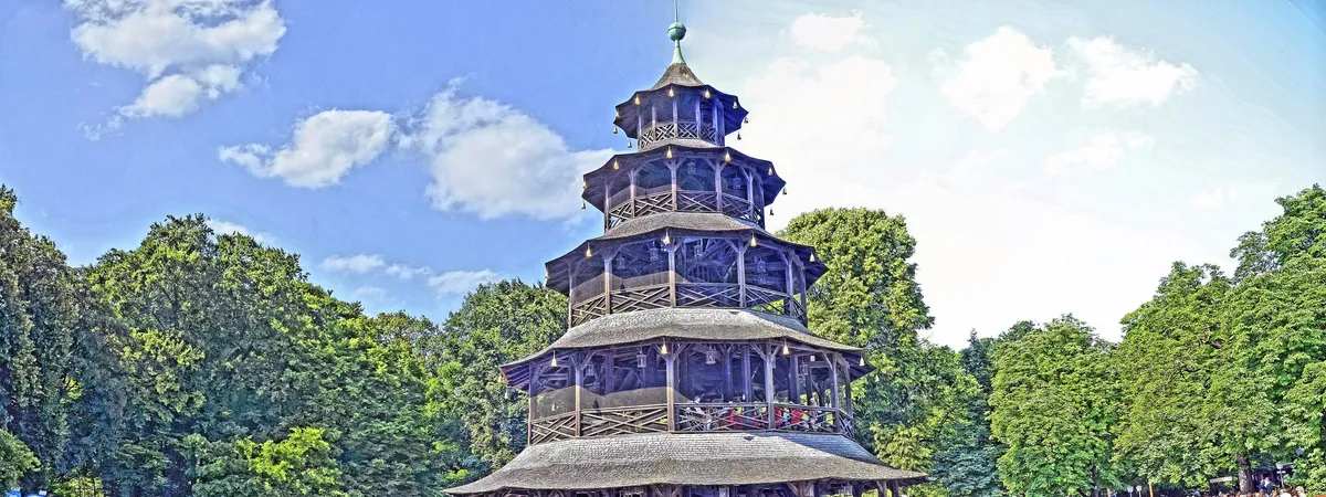 The wooden, pagoda-style Chinese Tower rising above the trees in Munich's Englischer Garten, on Schwabing's edge