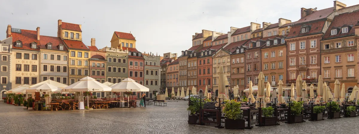Colorful merchant houses lining the Old Town Market Square in Warsaw's Stare Miasto