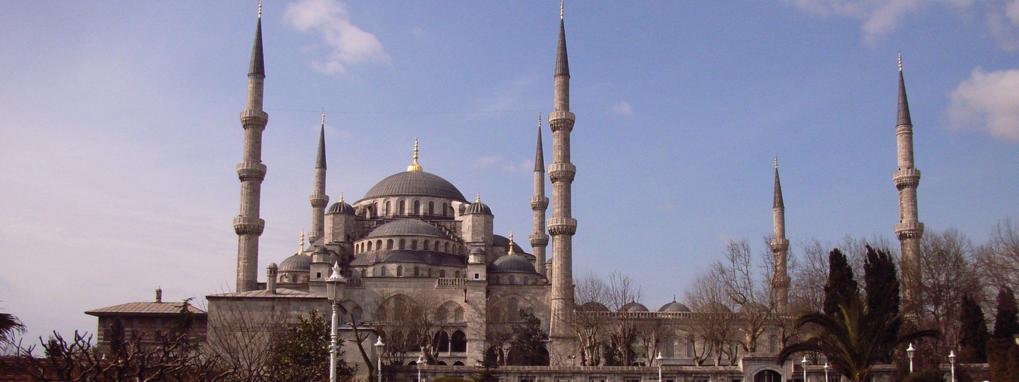 The Blue Mosque's six minarets and cascading domes rising above Sultanahmet Park in Istanbul's Old City