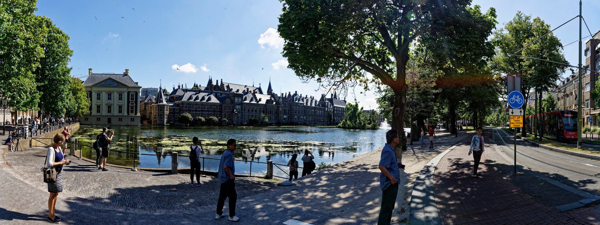 The Hofvijver pond with the Mauritshuis museum and the Binnenhof's spires reflected in the water