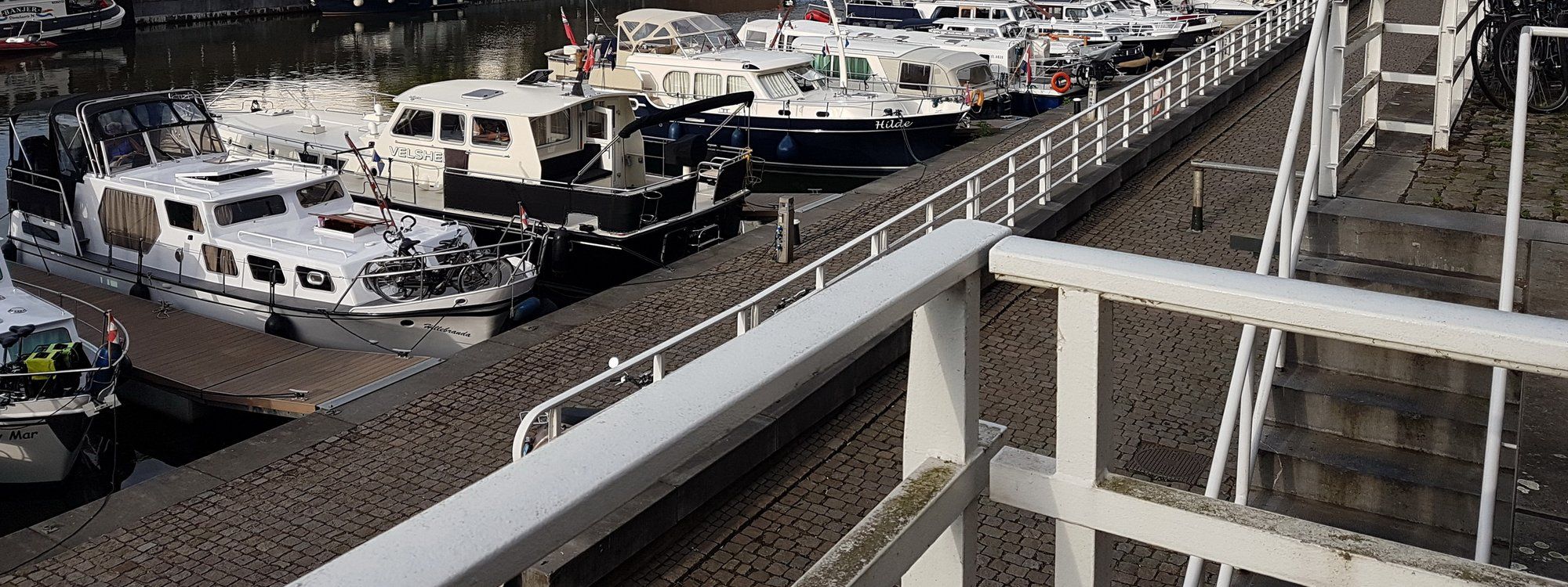 Boats moored in Maastricht's Bassin, a renovated 19th-century inner harbour in the Wyck neighborhood